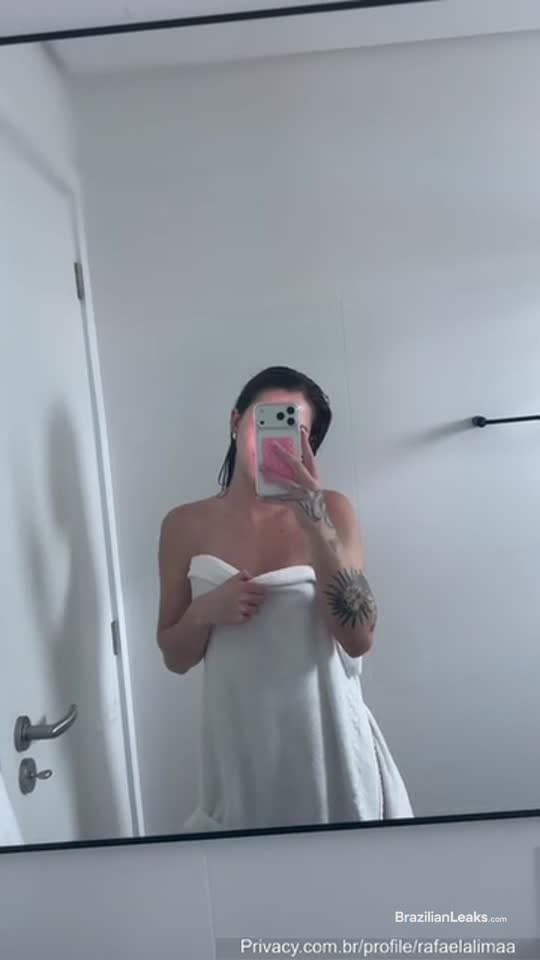 Rafaela Lima wraps herself in front of the mirror without clothes